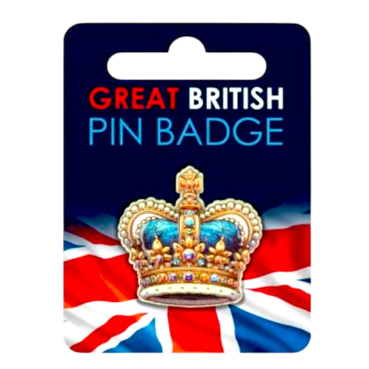 Close-up of a gold enamel crown pin badge with intricate detailing, displayed on a plain white background.